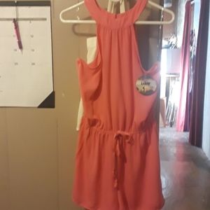 Bright pink romper brand new never worn.